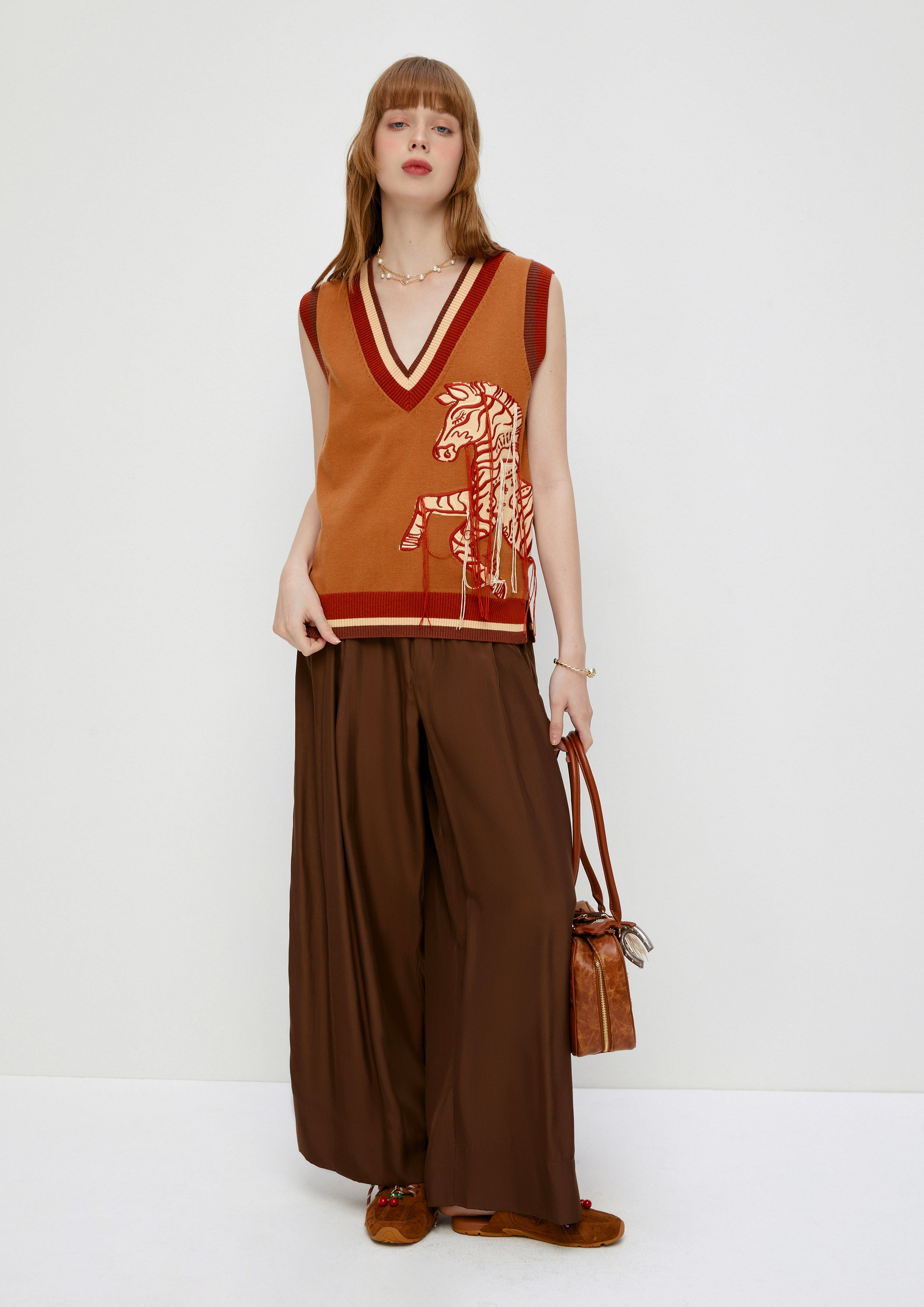 เสื้อกั๊ก ไหมพรม ลายม้าลาย Posh Escapade