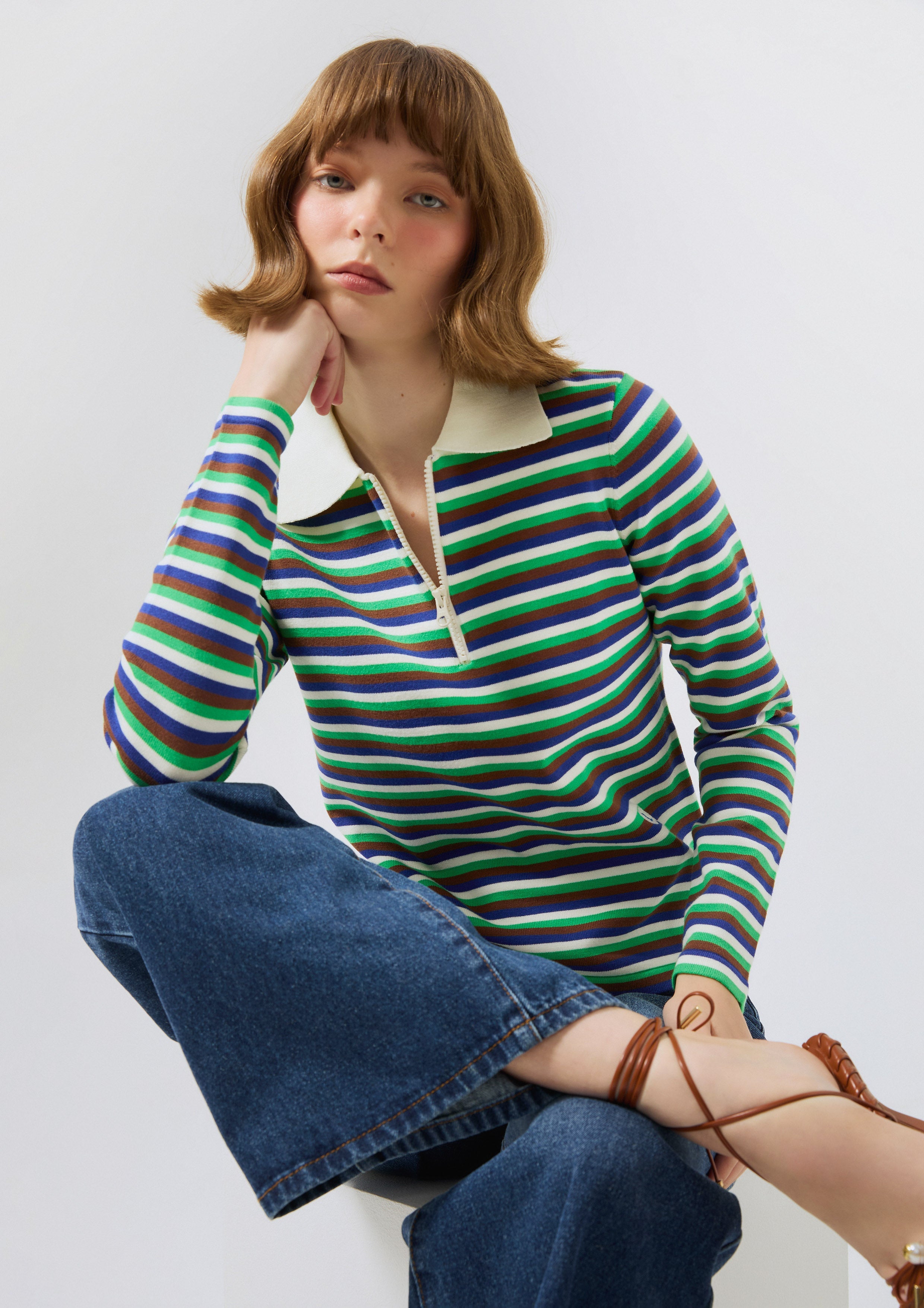 เสื้อแขนยาวลายทางพร้อมดีเทลโลโก้ คอลเลกชัน Miracle Voyard