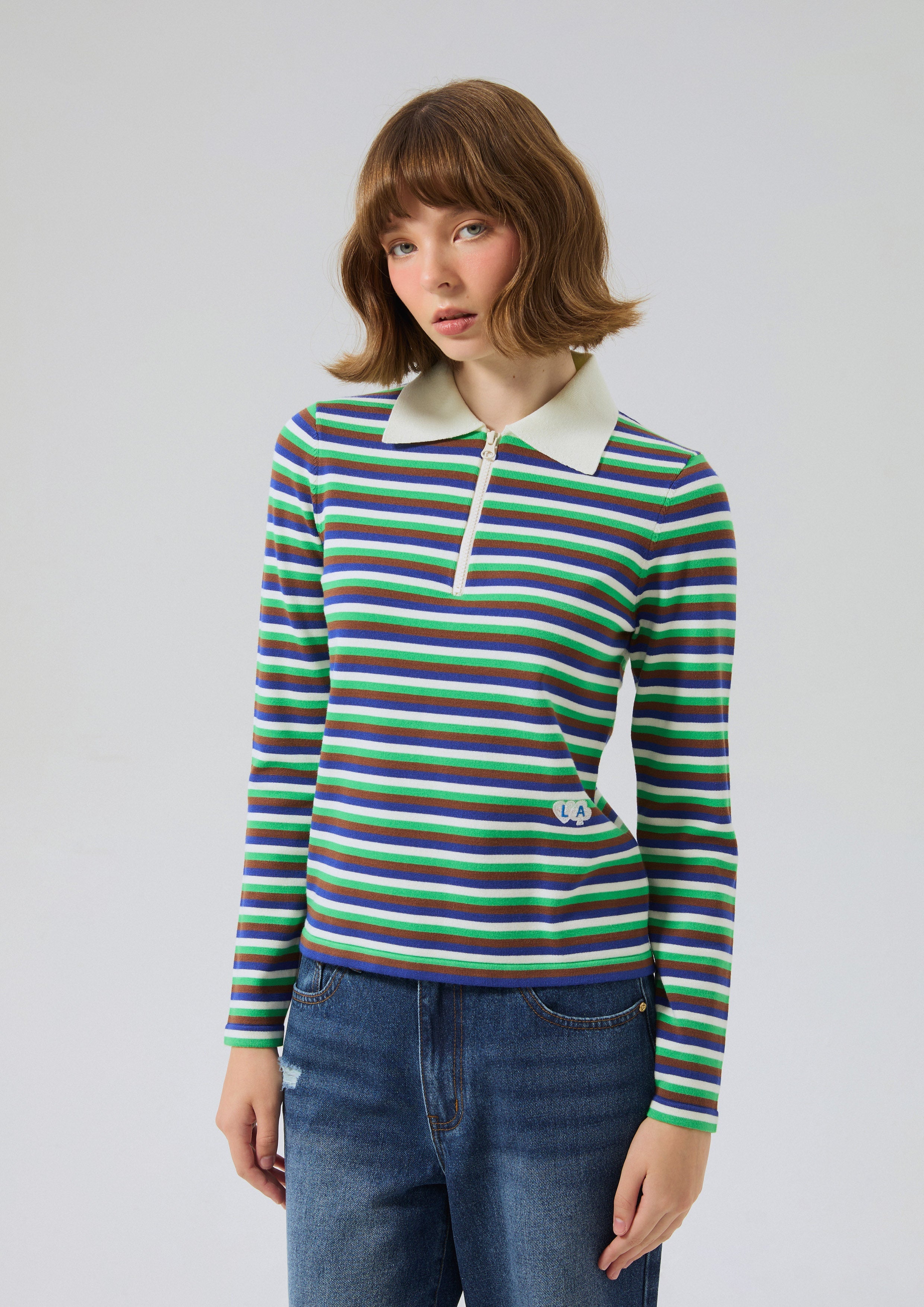 เสื้อแขนยาวลายทางพร้อมดีเทลโลโก้ คอลเลกชัน Miracle Voyard