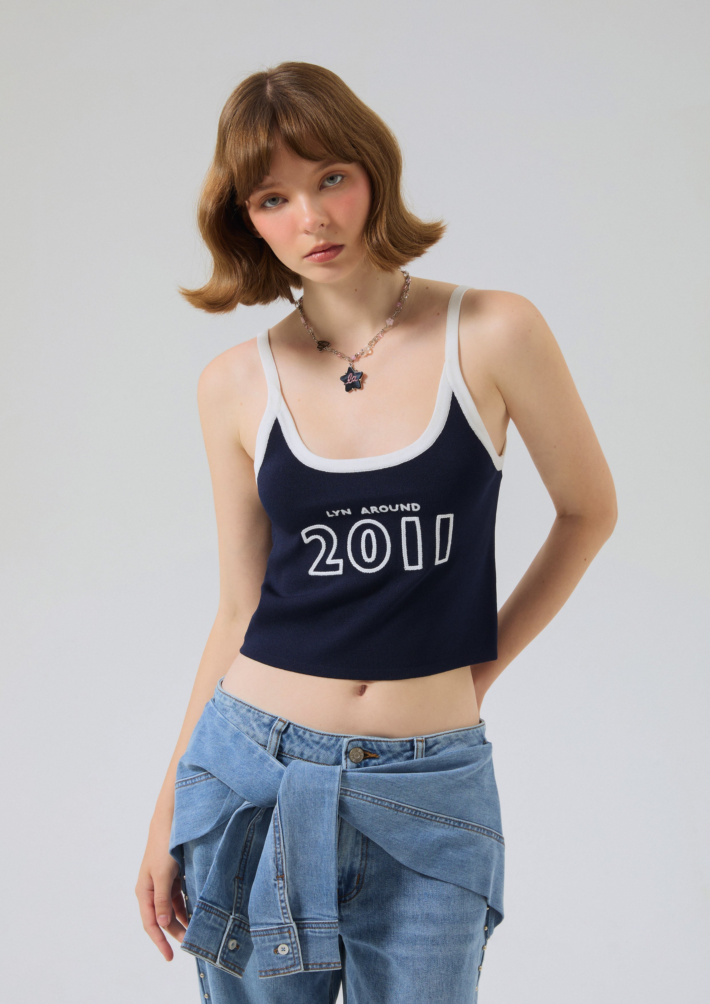 เสื้อครอปสายเดี่ยวปักโลโก้ คอลเลกชัน Speed Voyard