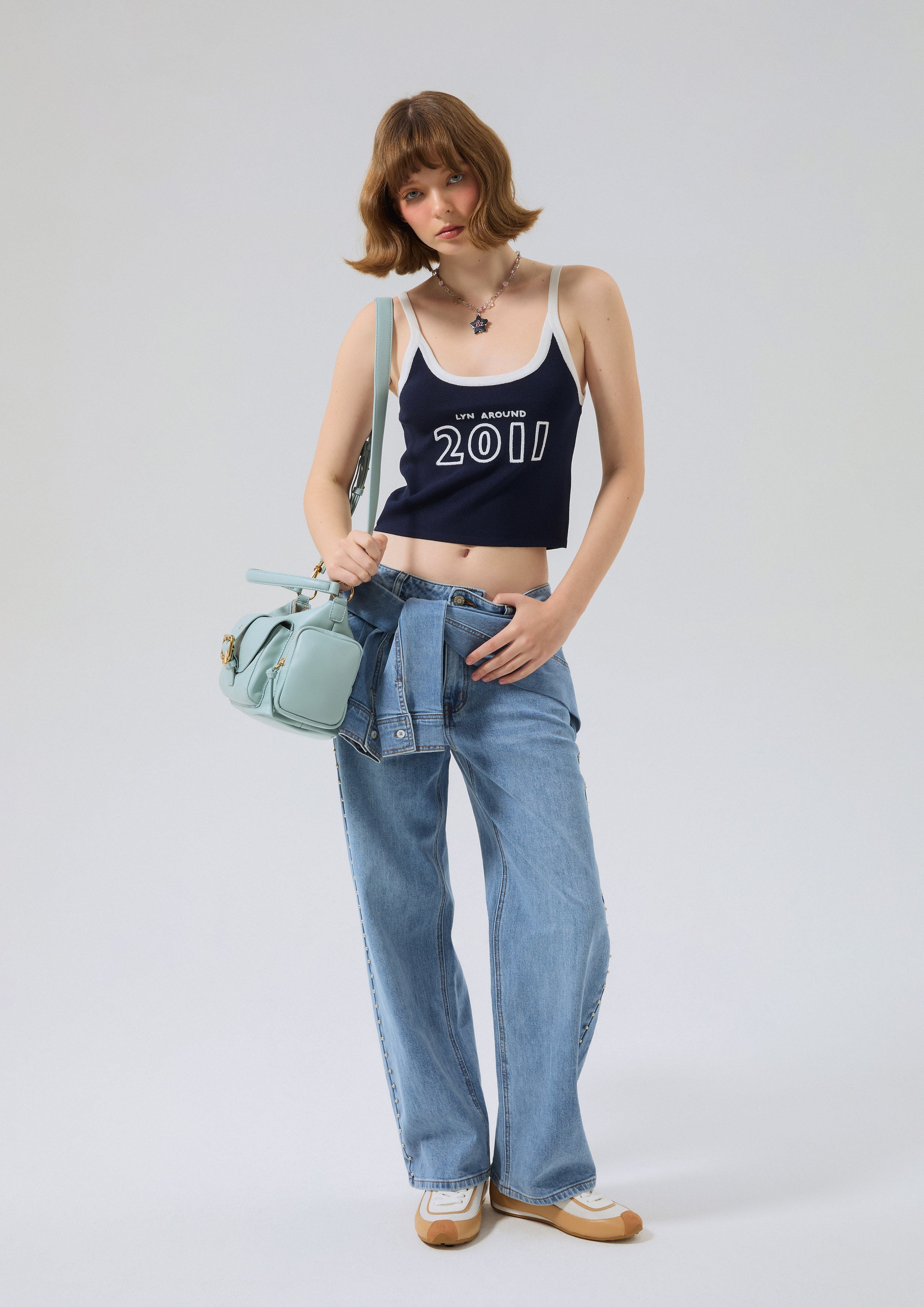 เสื้อครอปสายเดี่ยวปักโลโก้ คอลเลกชัน Speed Voyard