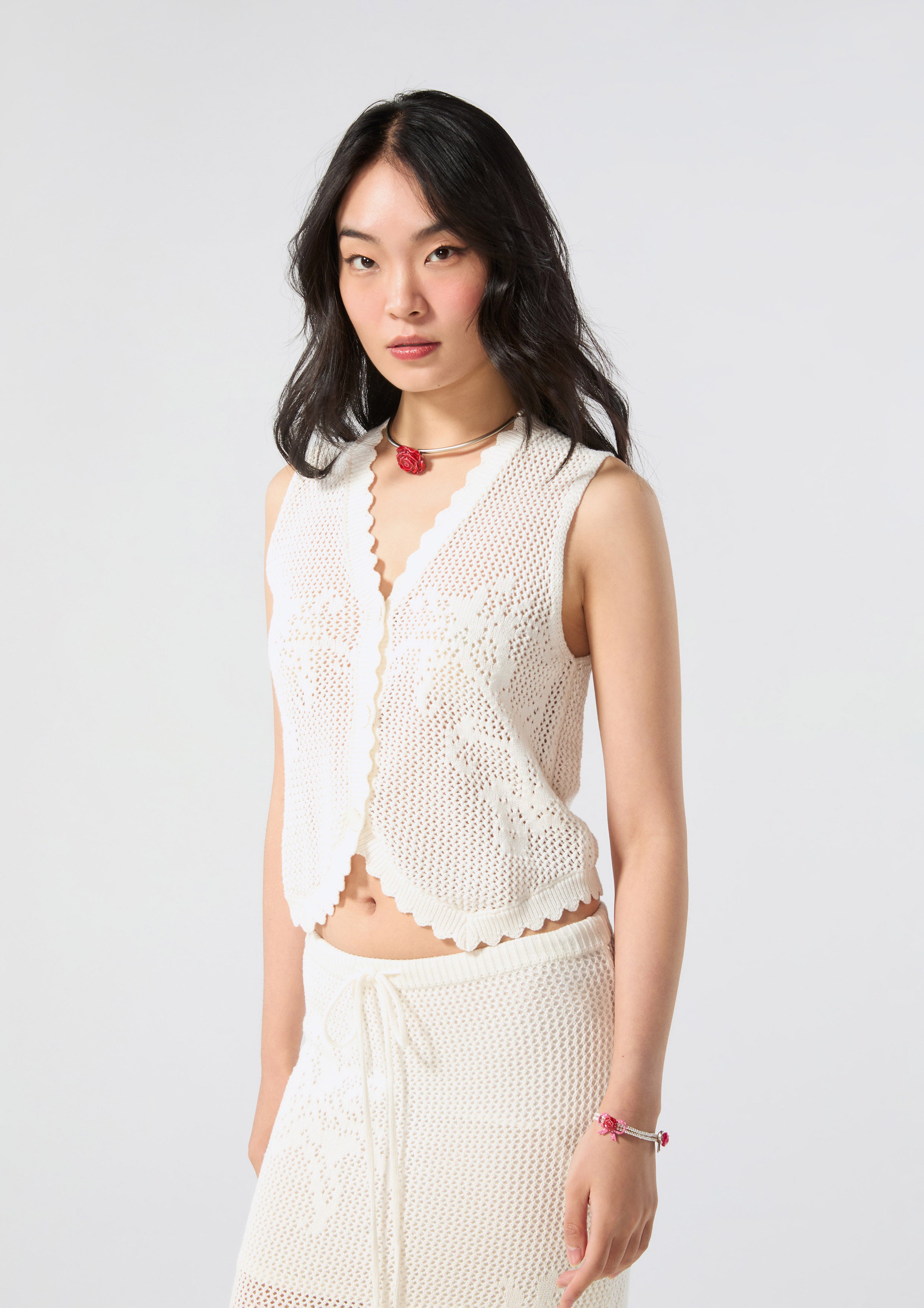 เสื้อกั๊กผ้านิตแต่งขอบลอน คอลเลกชัน Rodeo Rose