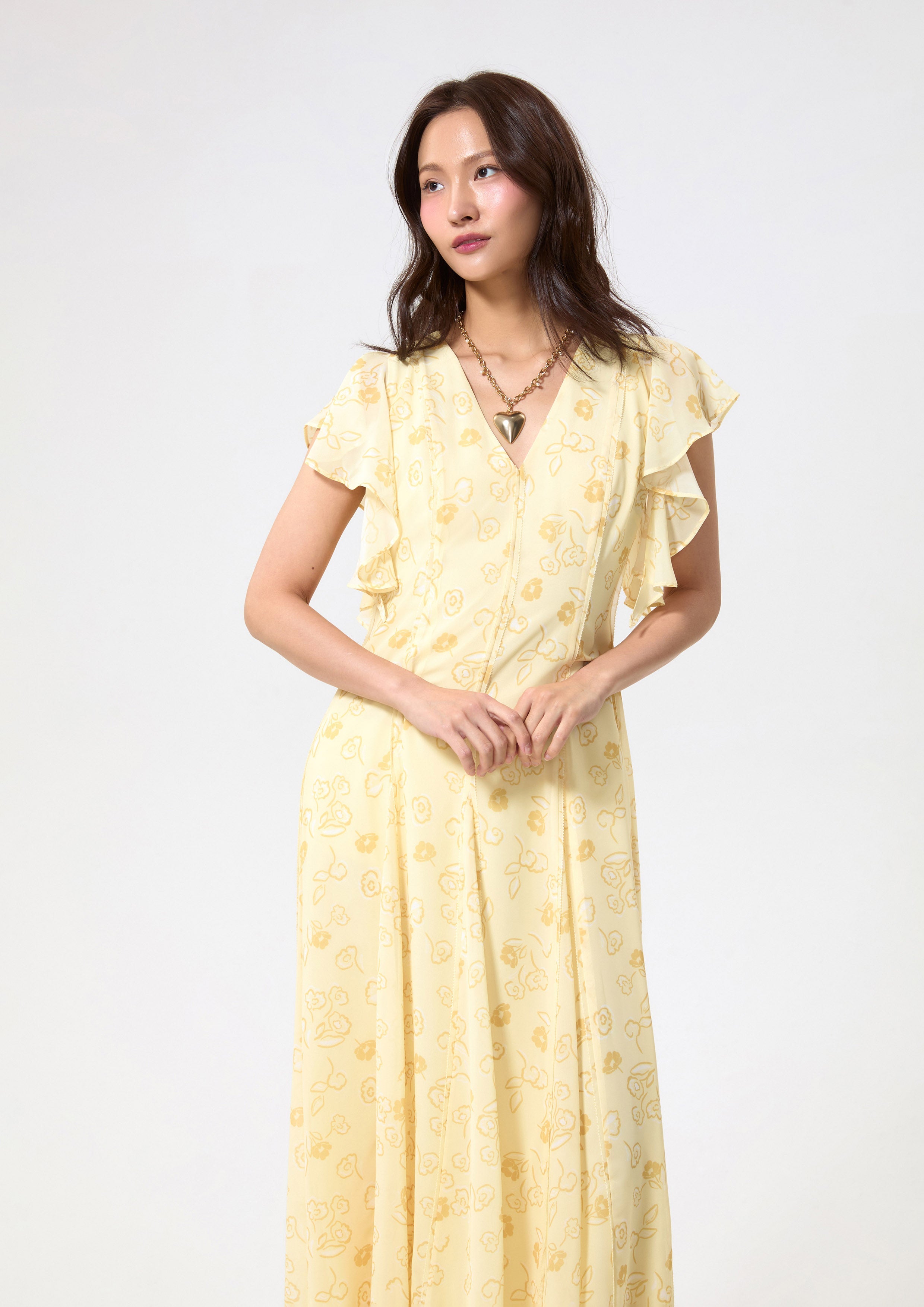 เดรสยาวพิมพ์ลายดอกไม้แขนสั้นผ้ารัฟเฟิล คอลเลกชัน Blossom Elegance