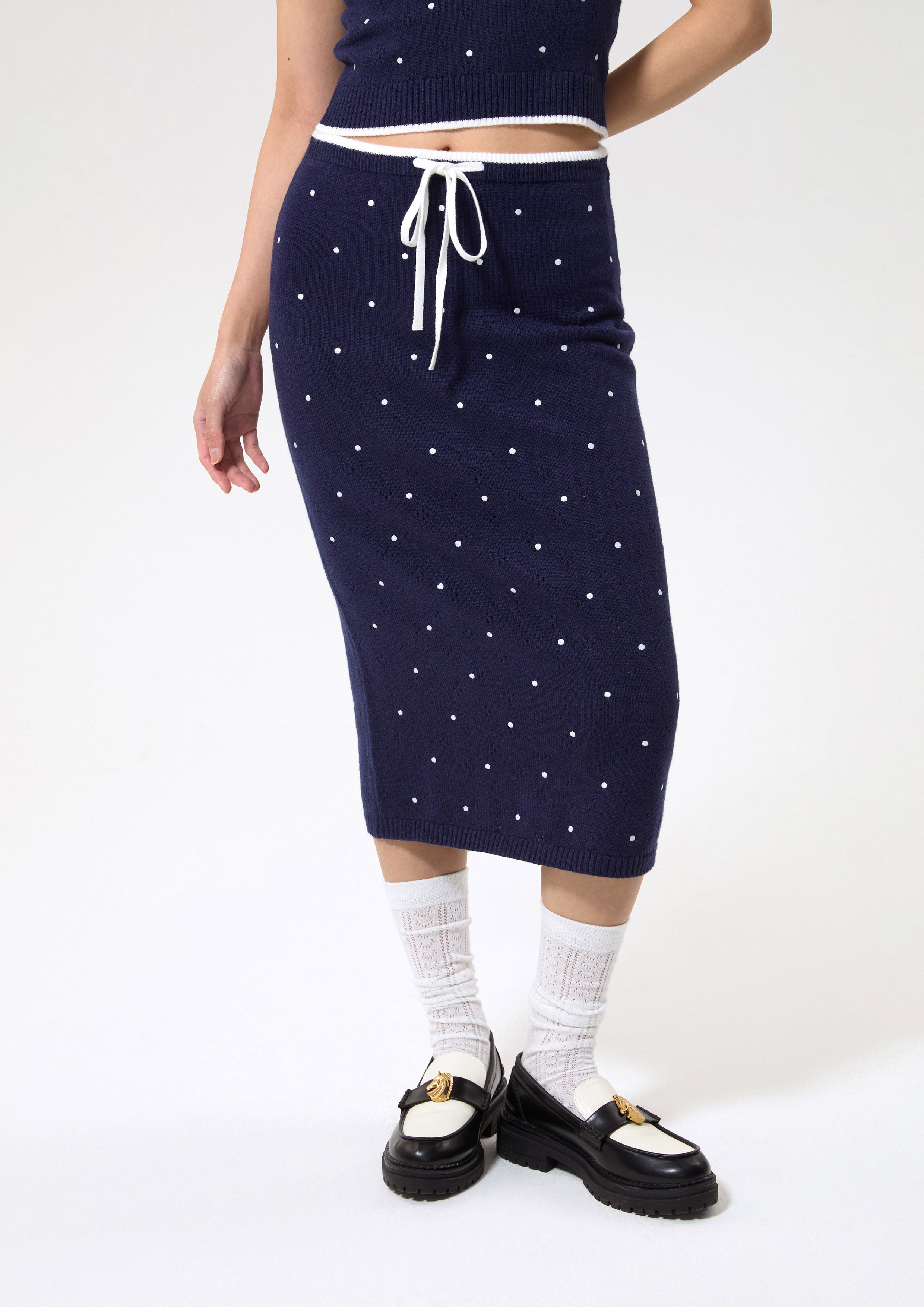 กระโปรงคลุมเข่าผ้านิตลายโพลกาดอต คอลเลกชัน Working on Board