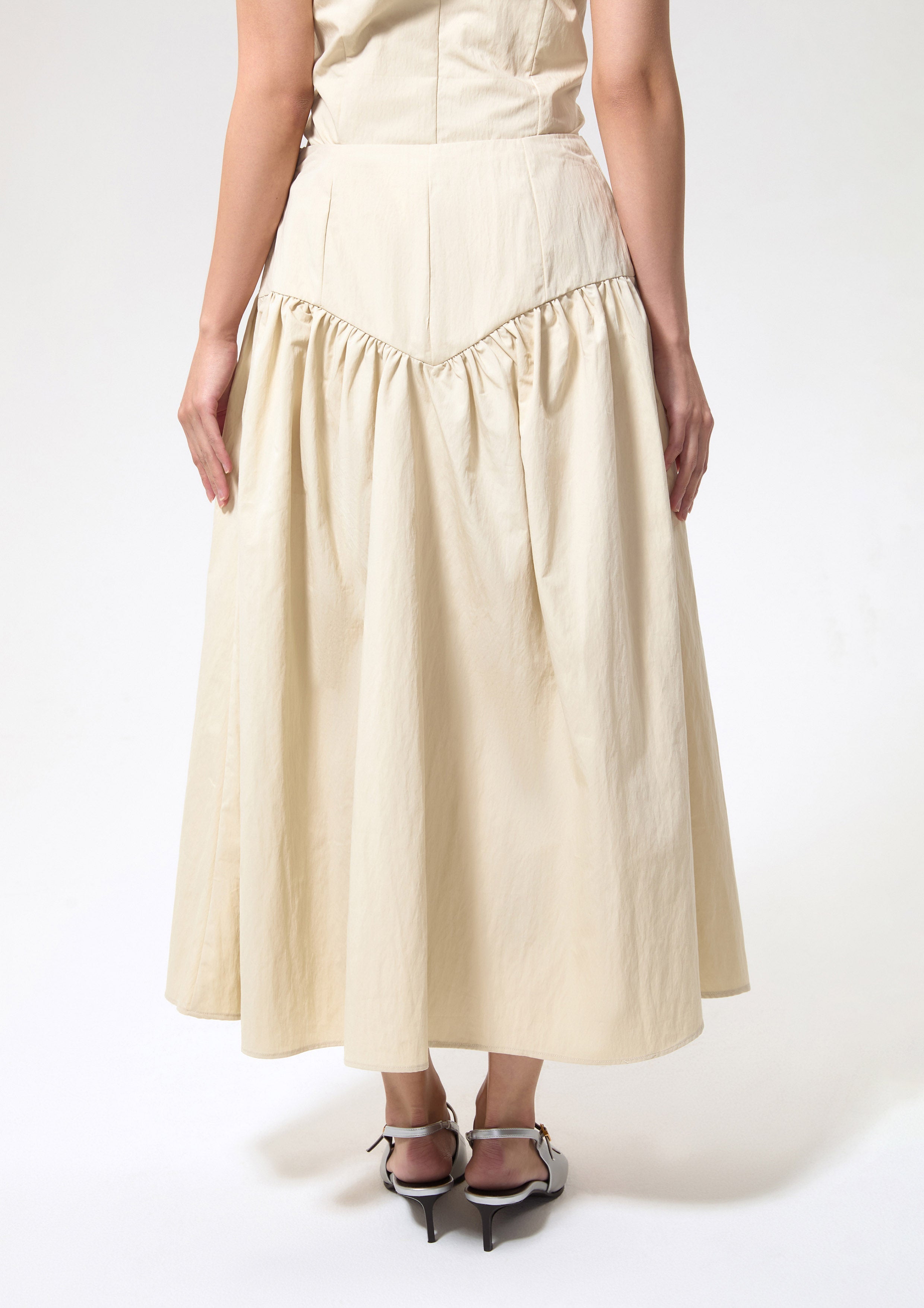 กระโปรงคลุมเข่าทรงระบายแต่งฮาร์ดแวร์โลหะ คอลเลกชัน Blossom Elegance