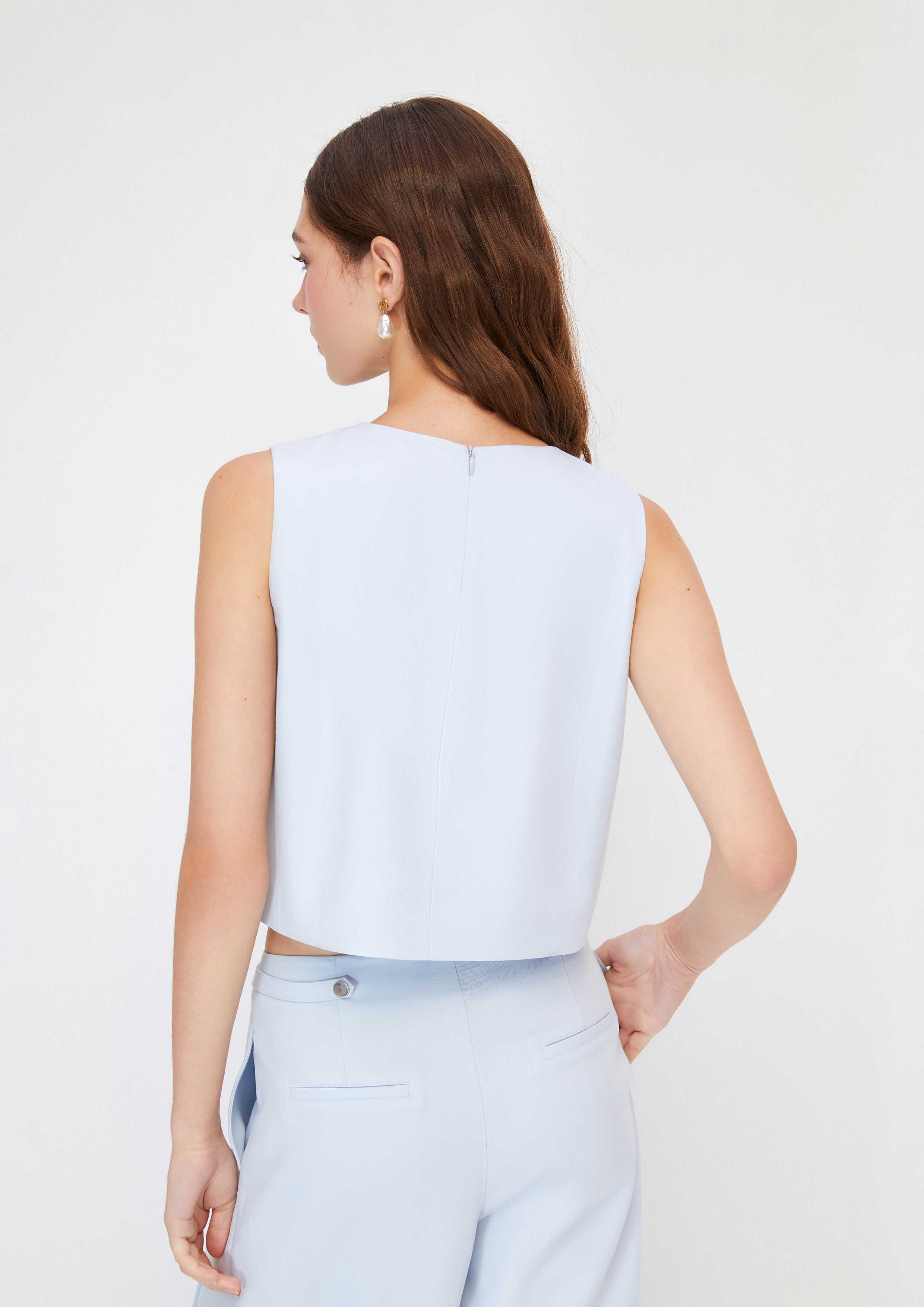 เสื้อแขนกุดติดกระดุม คอลเลกชัน Crystaline