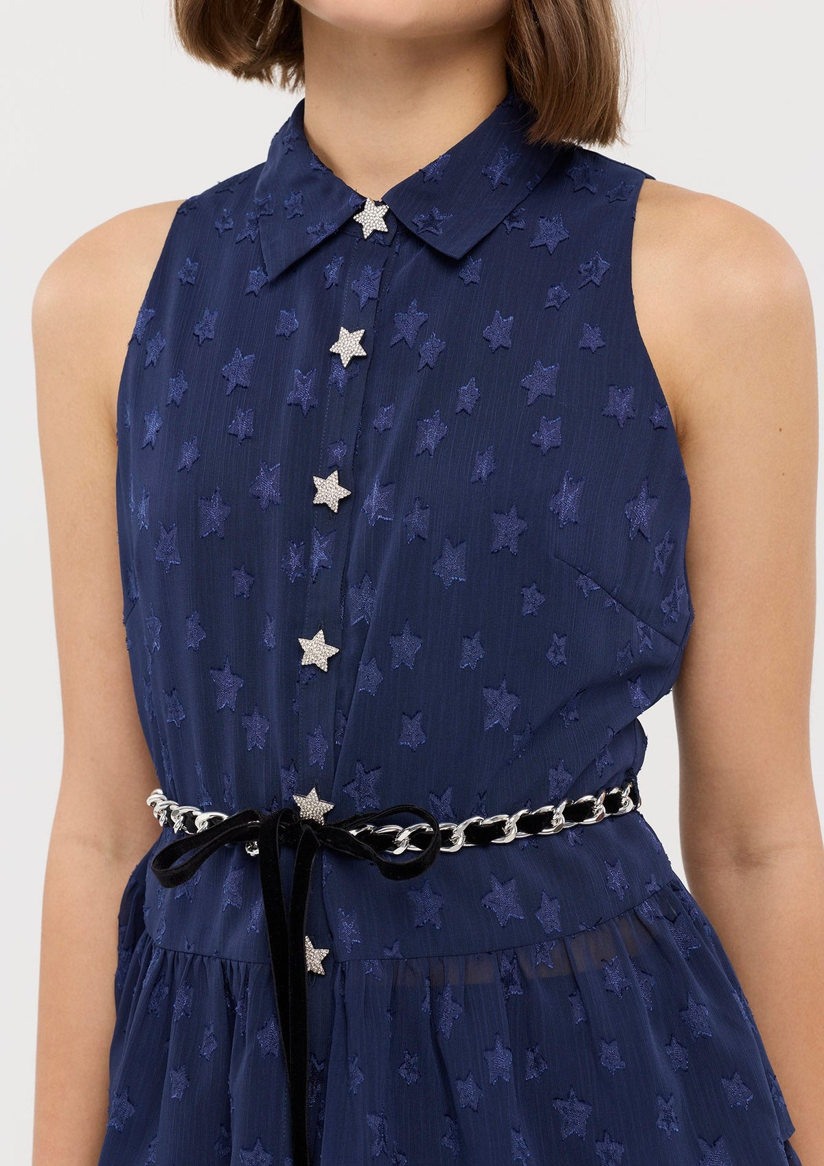 เสื้อแขนกุดพิมพ์ลายดาวแต่งระบาย คอลเลกชัน In Dream's Orbit