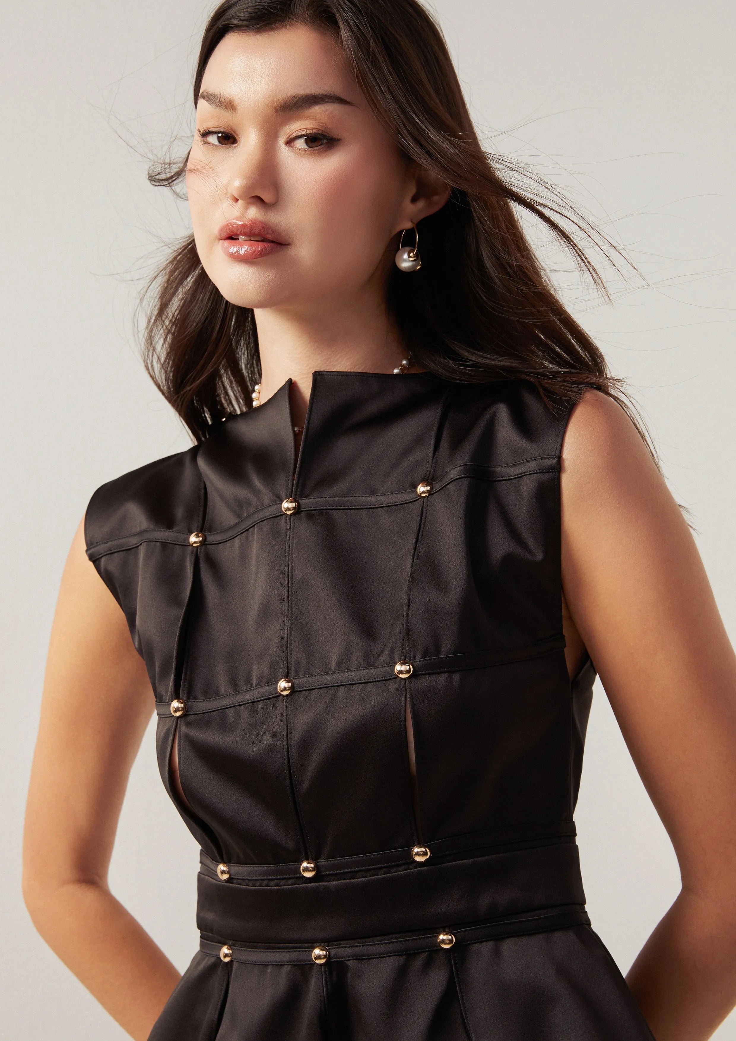 Metallic Stud Sleeveless Peplum Top