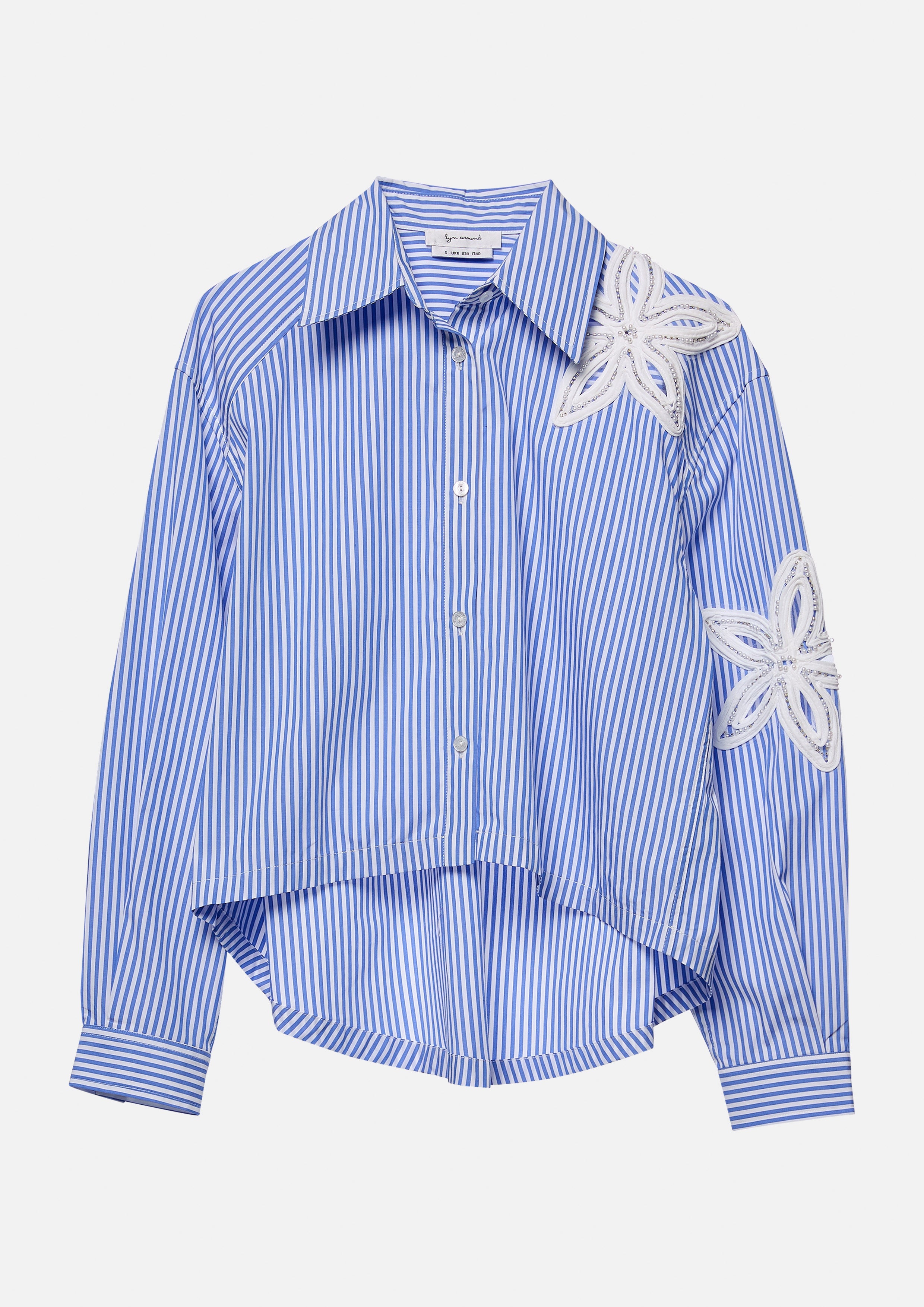 เสื้อเชิ้ตครอปลายทางฉลุลายดอกไม้ คอลเลกชัน Cruise to the Full Bloom