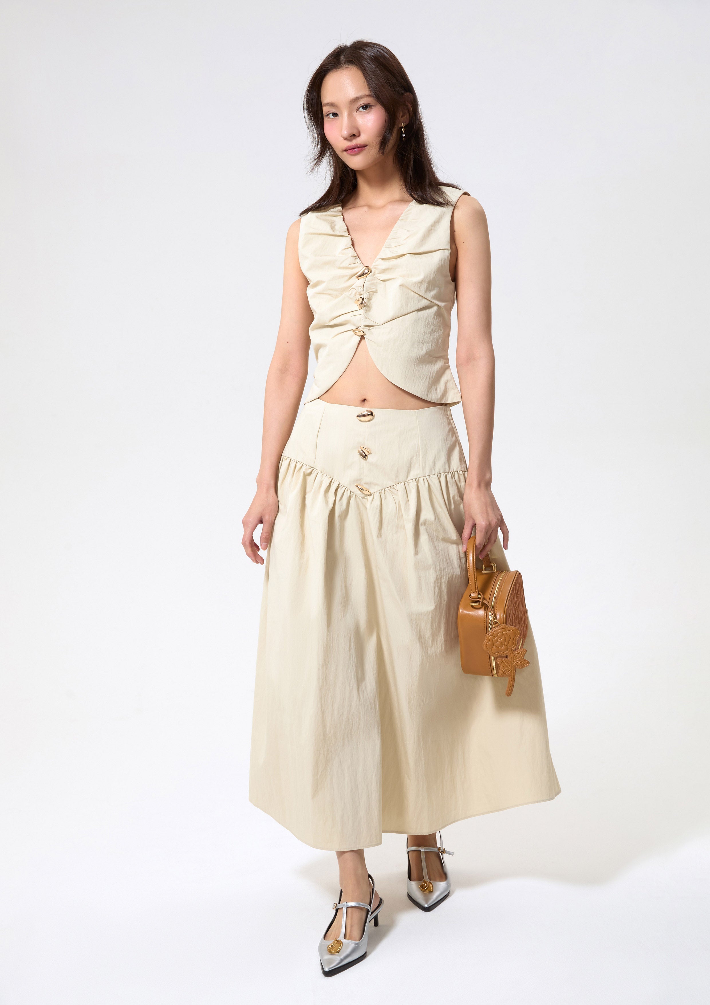 กระโปรงคลุมเข่าทรงระบายแต่งฮาร์ดแวร์โลหะ คอลเลกชัน Blossom Elegance