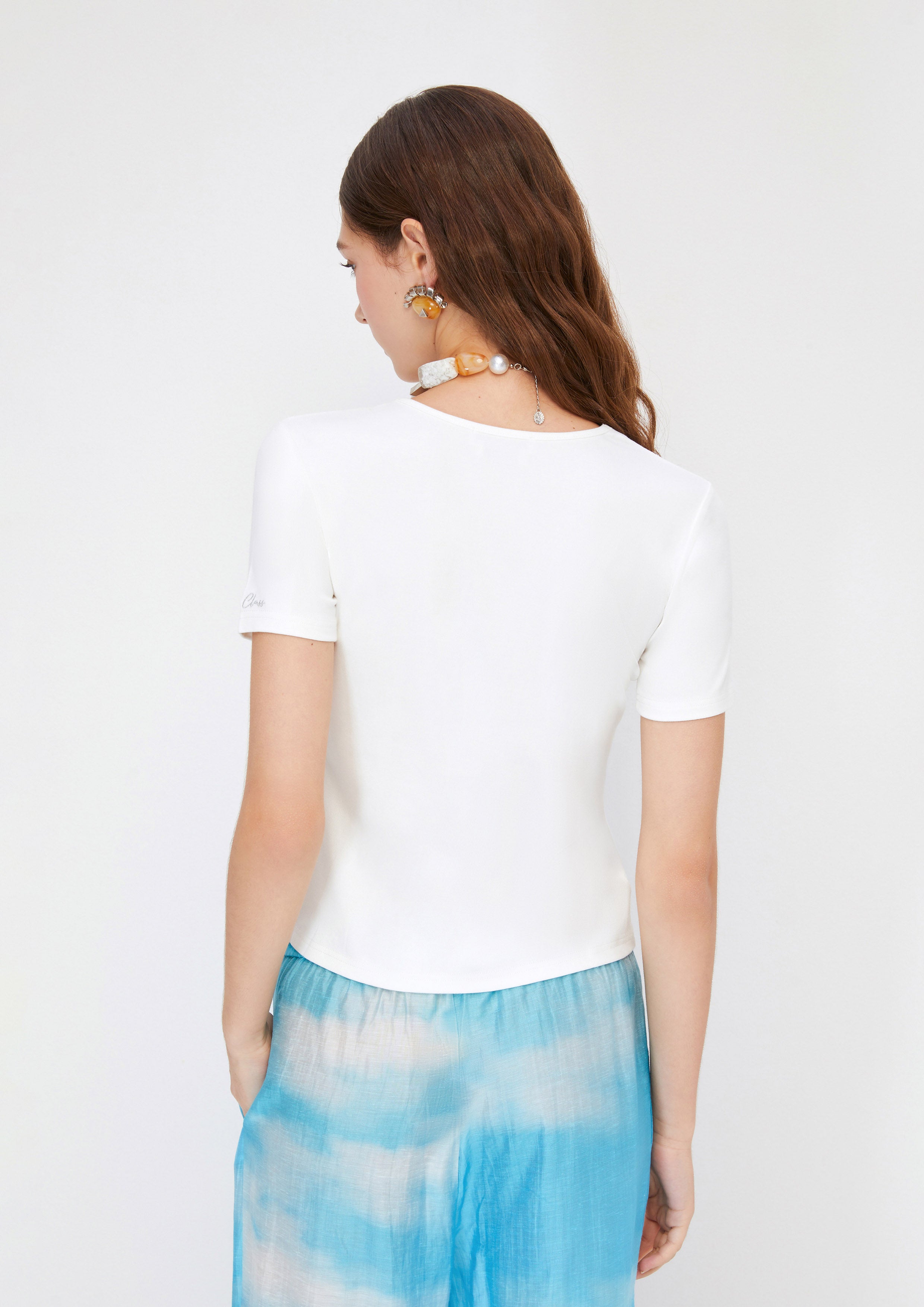 เสื้อยืดแขนสั้นคอเสื้อขอบลอน คอลเลกชัน Crystaline