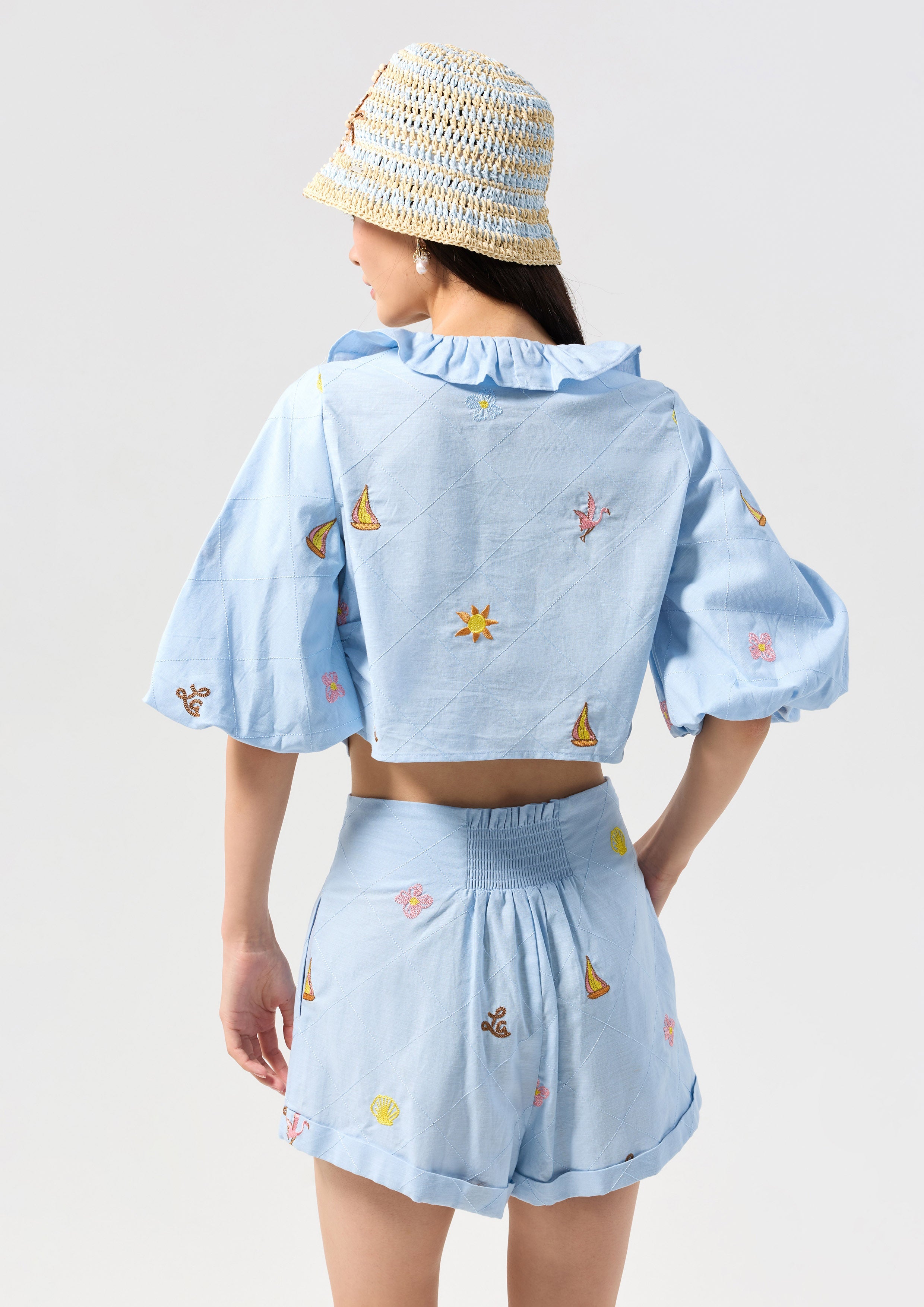 เสื้อเบลาส์ครอปพิมพ์ลายแต่งระบาย คอลเลกชัน Palm Spring